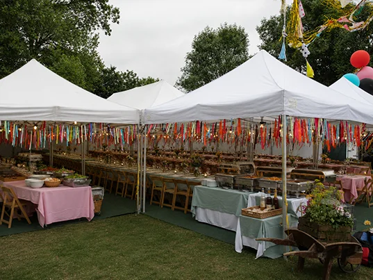 Festival catering equipment arranged inside a temporary structure