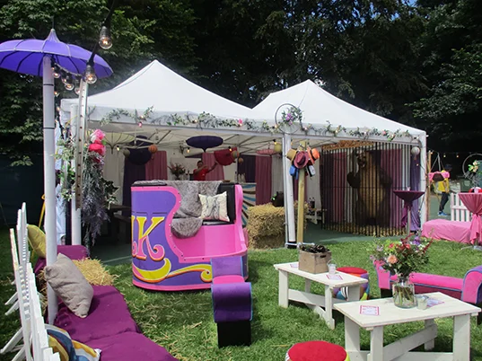 Furnished VIP lounge inside a festival marquee