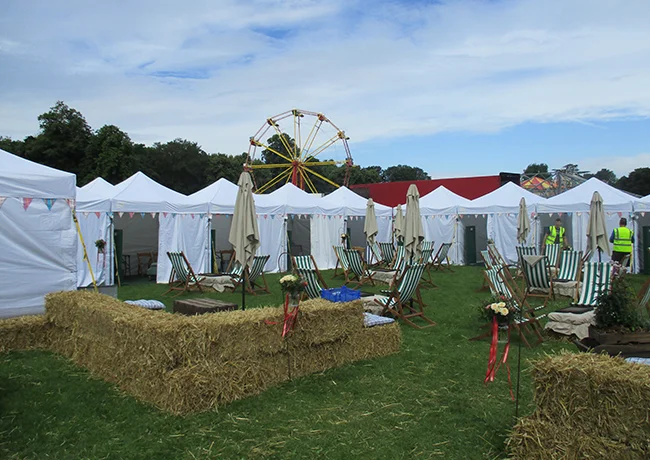 Gazebo arranged as a festival VIP and chill-out space