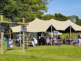 Open-sided stretch tent at a festival
