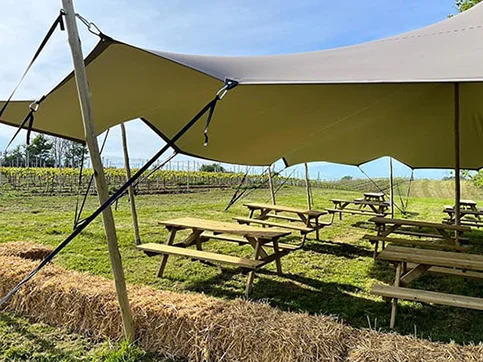 Stretch tent creating an open covered festival area